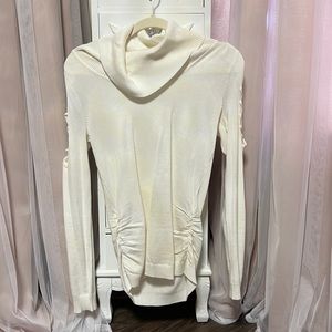A cream sweater